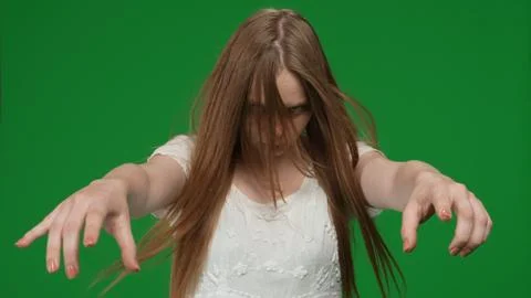Medium green screen, chroma key shot of a posessed female, woman figure, ghost 스톡 사진