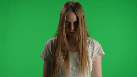 Medium green screen, chroma key shot of a posessed female, woman figure, ghost 库存照片