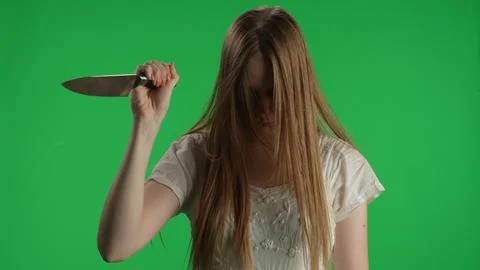Medium green screen, chroma key shot of a posessed female, woman figure, ghost 스톡 사진