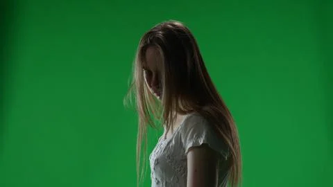 Medium green screen, chroma key shot of a posessed female, woman figure, ghost Stock Photos