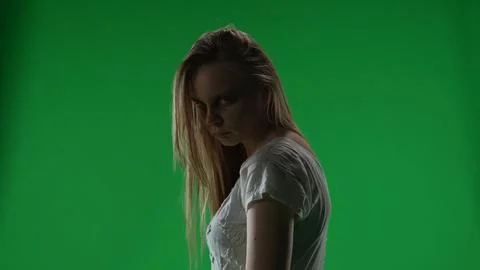 Medium green screen, chroma key shot of a posessed female, woman figure, ghost Foto stock