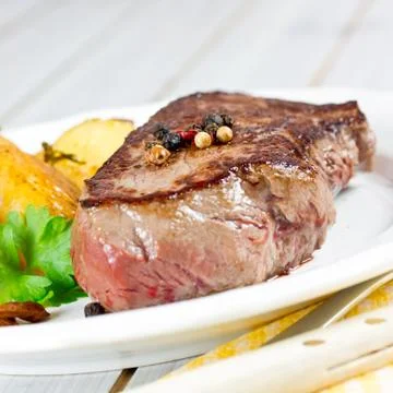 Medium grilled steak Stock Photos