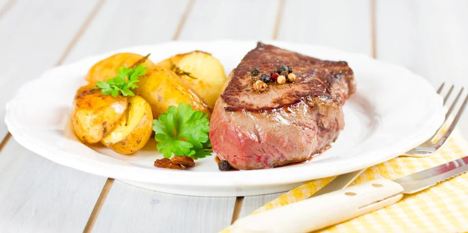 Medium grilled steak Stock Photos