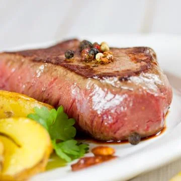 Medium grilled steak Stock Photos