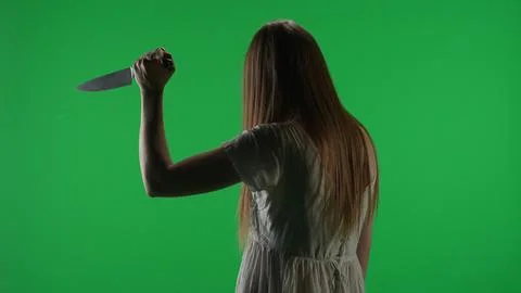 Medium half turn green screen, chroma key shot of a posessed female figure Stock Photos