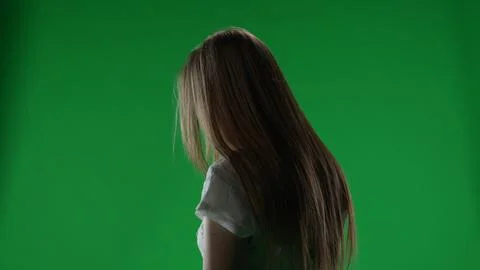 Medium half turn green screen, chroma key shot of a posessed female figure Stock Photos