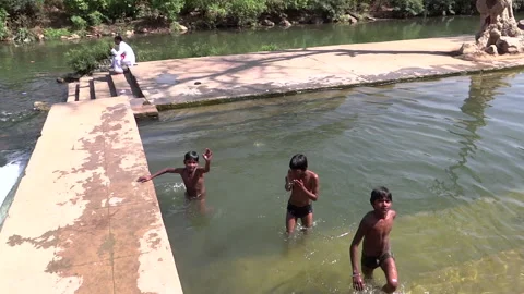 kids bathing in river
