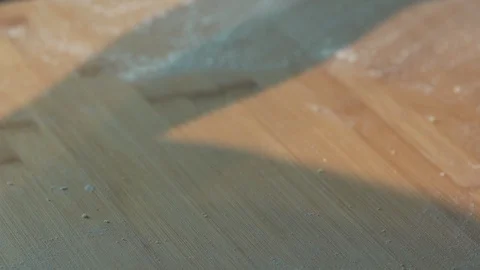 Medium high close up with shadow of a man shaping a homenade pizza dough bread Stock Footage 127973922