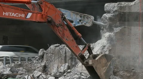 Medium of jack-hammer and back hoe at work Stock Footage 49892726