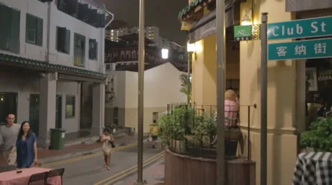 A medium left to right pan on club street Stock Footage 36175965