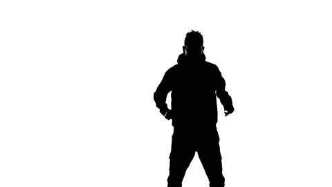 Medium long shot of guy dancing hip hop, freestyle, street dance, silhouette Stock Footage 130319522