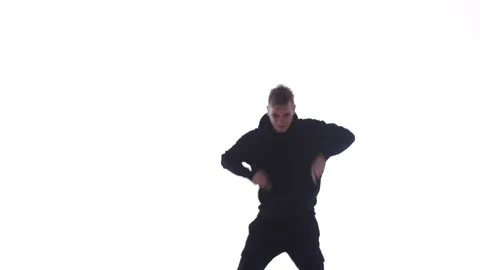 Medium long shot of guy dancing hip hop, freestyle, street dance, isolated Stock Footage 130326390