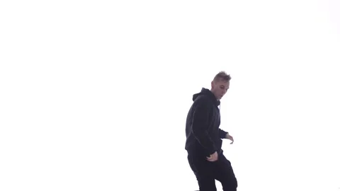 Medium long shot of guy dancing hip hop, freestyle, street dance, isolated Stock Footage 130326444