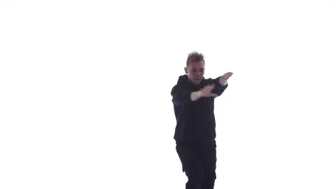 Medium long shot of guy dancing hip hop, freestyle, street dance, isolated Stock Footage 130326570