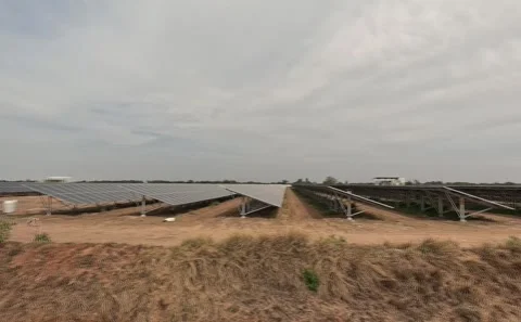 Medium long shot of six industrial team members walking abreast across an Stock Footage 341870802