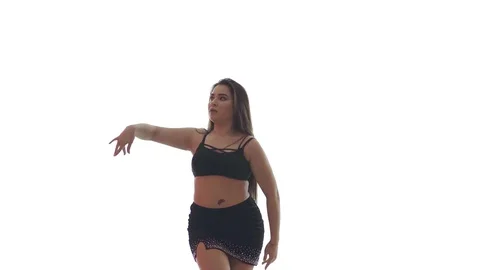 Medium long shot of a woman dancing oriental belly dance, isolated Stockbeeldmateriaal 129052806