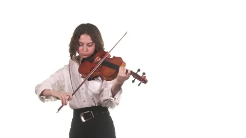 Medium long shot of young talented woman playing the classical violin. Isolated Stock Footage 133333227
