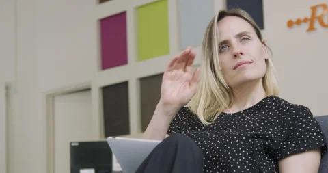 Medium low angle view of female home decoration business owner sitting at desk Stock Footage 277966347