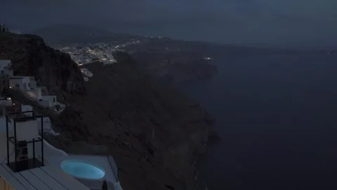 Medium night shot form Thira, Santorini to the south side caldera Stock Footage 257670914