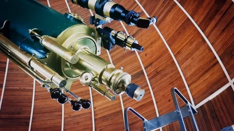 Medium panning shot of telescope at the observatory Stock Footage 122471316