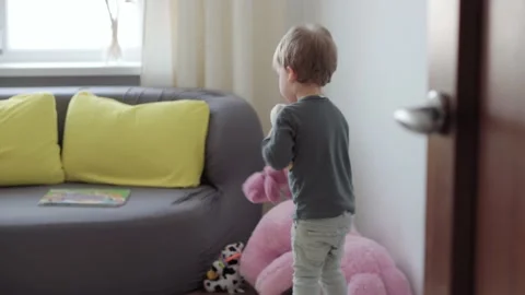 Medium plan authentic little preschool child boy 2-3 years in sweater and jeans Stock Footage 149358118