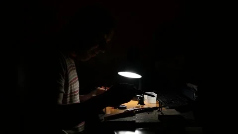 Medium plan a man is engaged in soldering small items 스톡 동영상 148172445