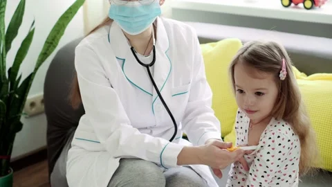 Medium plan of young Caucasian slavic woman nurse or doctor pediatrician Stock Footage 149071255