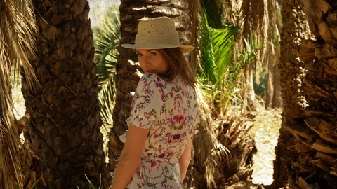 Medium Portrait Shot of Female Model with Brown Hair and Straw Hat 스톡 동영상 116560403