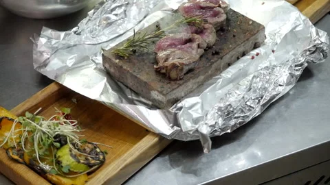 Medium Rare Meat on a Hot Stone Stock Footage 132106201