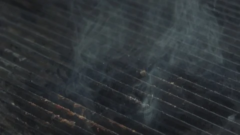 Medium-rare piece of beef meat is falling on a frying surface Stock Footage 92179540