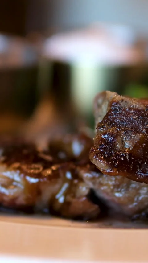Medium rare steak Extreme close up shot on piece of steak cutting using a Stock Footage 295839473