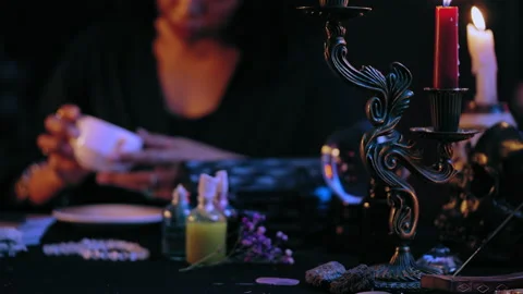 Medium reading coffee grounds, looking into cup to tell future, witchcraft Stock Footage 201332460