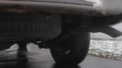 Medium Right Moving on SUV Idling in Winter Stock Footage 61951395