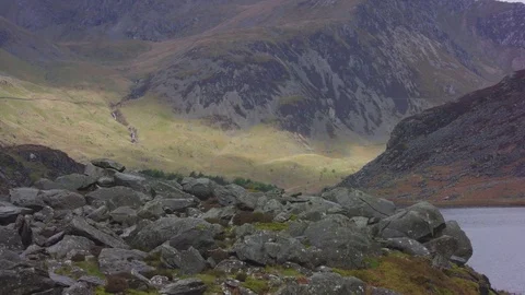 Medium Rocks in Front of Grass Valley Видео 75565177