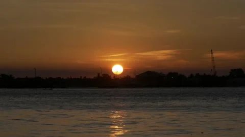 Medium shoot, scenic red and orange sunset over Barito river Stock Footage 141303466