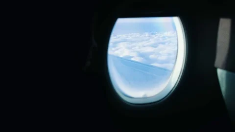 Medium shot from airplane illuminator to sky and clouds Stock Footage 121978782