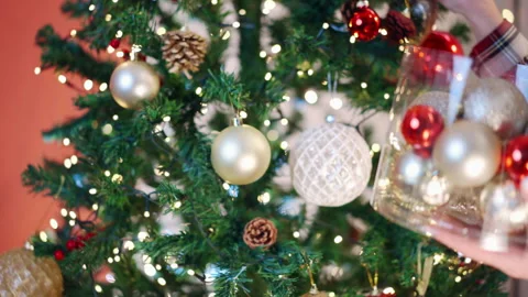 Medium shot of amazing winter spruce tree decorated with blinking garlands at Stock Footage 250649703
