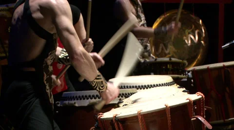 Medium shot of arms and hands of three taiko drummers Stock Footage 39173885