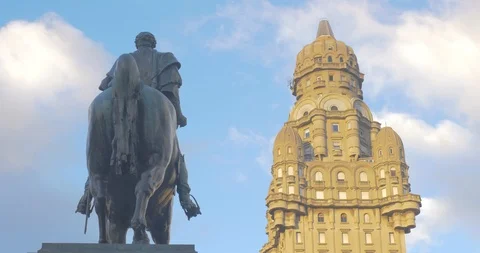 Medium shot from behind the General Artigas statue looking at Palacio Salvo Stock-Footage 92363807
