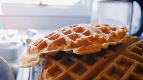 Medium Shot of a Belgian Waffle Falling on a Pile of Waffles in Slow Motion Stock Footage 86486068