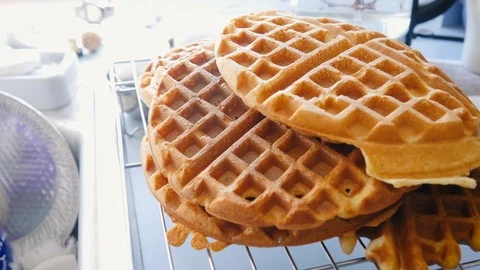 Medium Shot of Belgian Waffles Cooling on a Rack in 4k Stock Footage 86611963