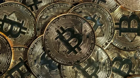 Medium shot Bitcoin cryptocurrency coins digital gold coins Stock Footage 194891233
