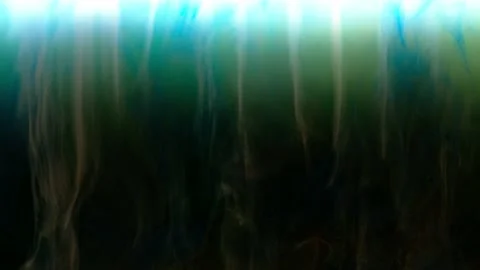 Medium shot of blue and green paint swirl underwater Stock Footage 147314255
