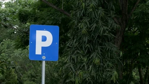 Medium shot, blue parking road sign. Indonesian traffic signage Stock Footage 139344002