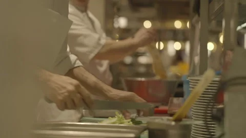 Medium shot chef cutting apple into fries Stockbeeldmateriaal 336173880