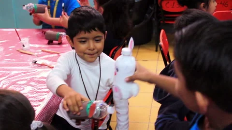 MEDIUM SHOT. Children doing school activities in the kindergarten. Stock Footage 48438658