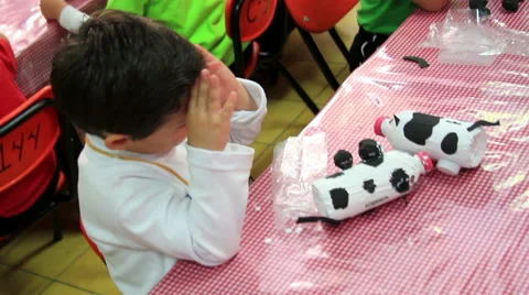 MEDIUM SHOT. Children doing school activities in the kindergarten. Stock Footage 48495016