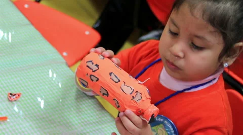 MEDIUM SHOT. Children doing school activities in the kindergarten. Stock Footage 48846354