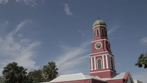 Medium Shot of Clock tower at the Garrison Savannah in Barbados Stock Footage 72472173