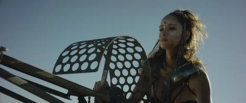 Medium Shot Closeup: Desert Stalker Scanning Horizon Atop Car v.1 動画素材 90724176